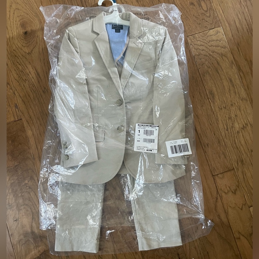 Crew cuts Thompson suit